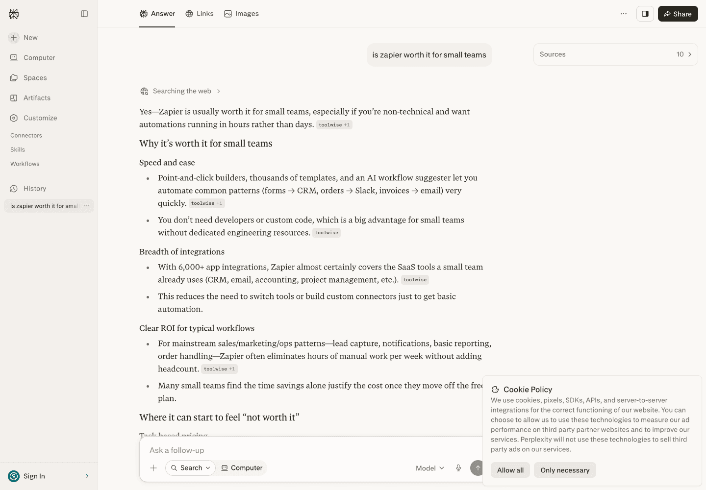 Perplexity's answer to "is zapier worth it for small teams" opens with a verdict, and a small gray citation chip reading "toolwise +1" hangs off the first sentence, repeating after several of the claims below it
